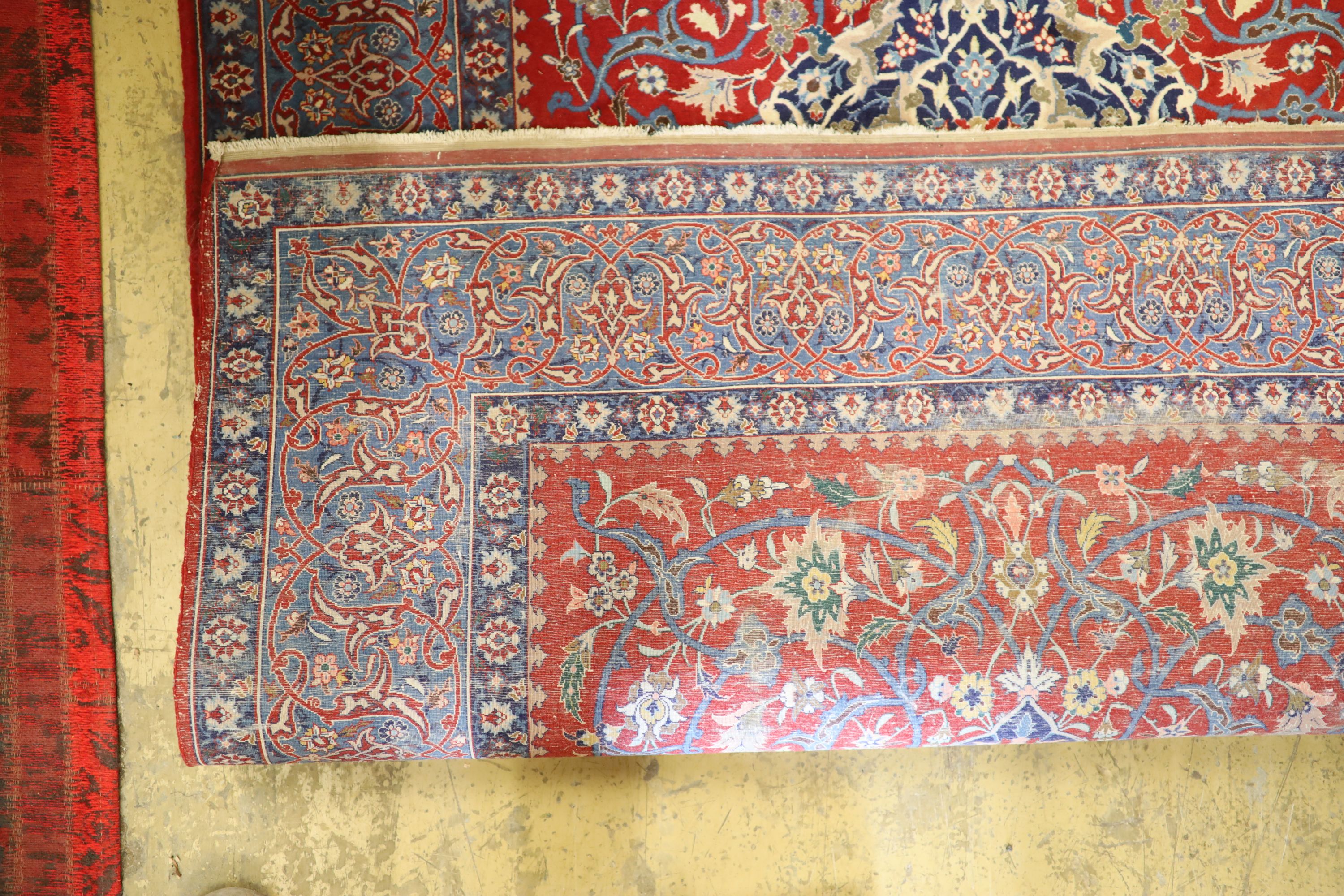 An Isfahan red ground rug, 169 x 110cm